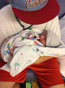 Josh holding Miller baby